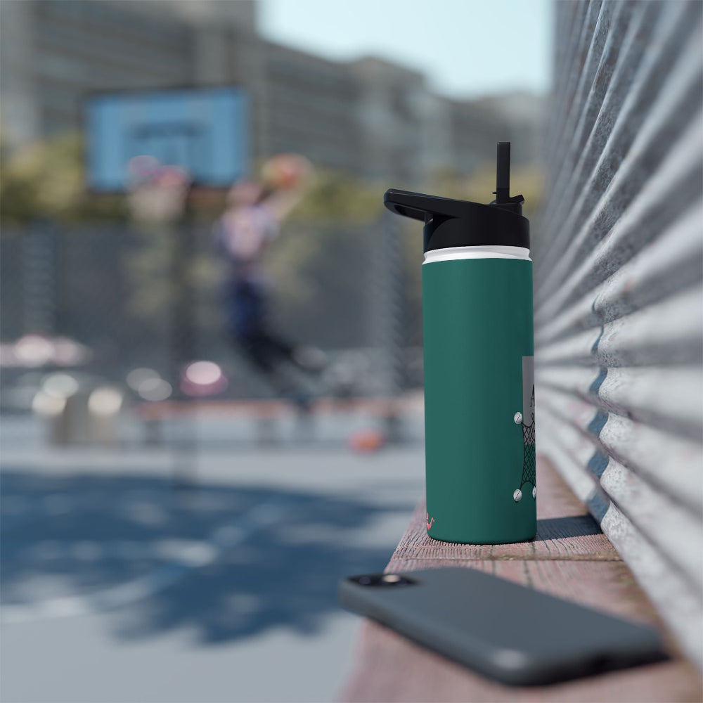 PBP 18oz. Tackle Box Style water bottle with black cap and straw sitting on a ledge with a basketball court background