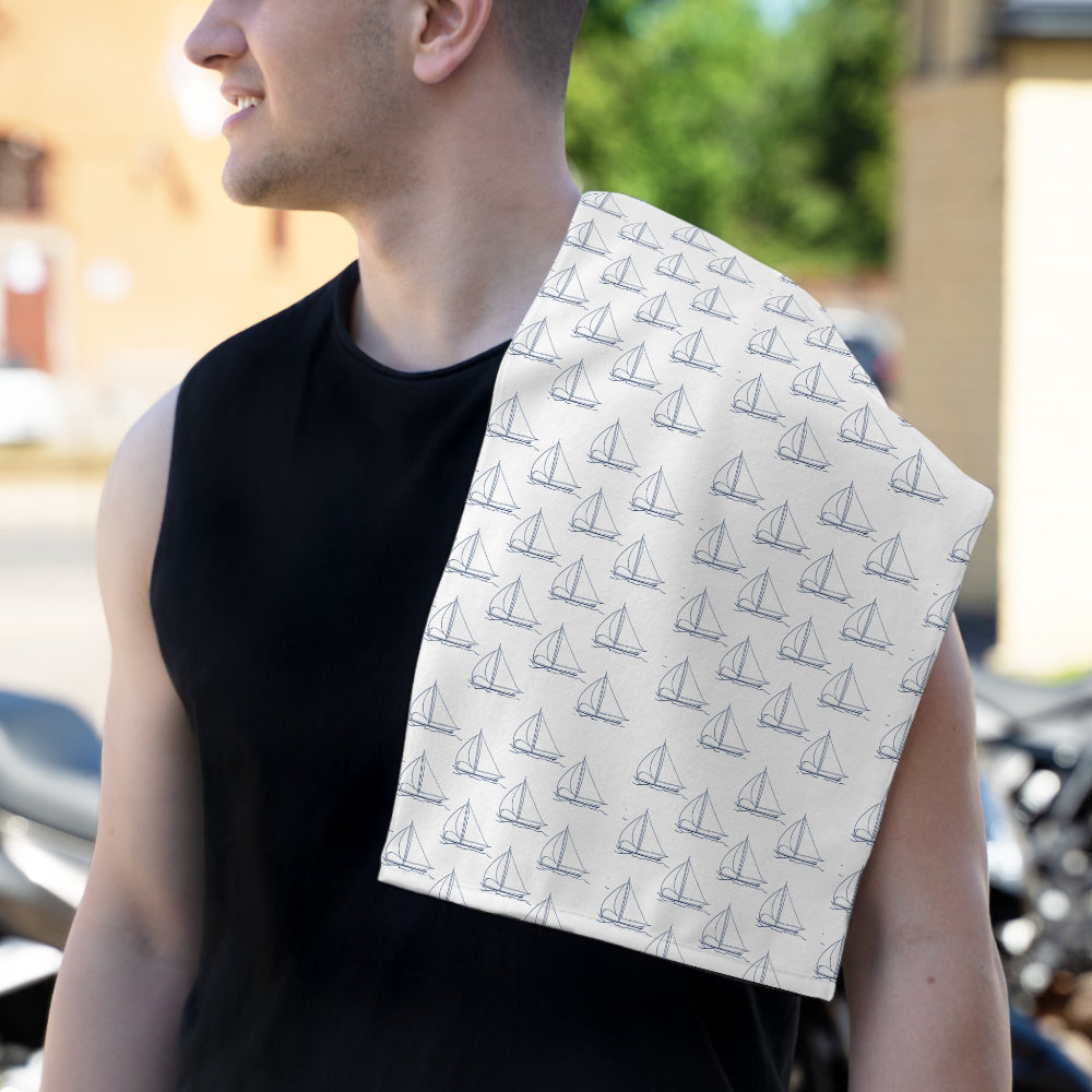 Dad wearing the PBP Nautical burp cloth with sailboat pattern over their shoulder outdoors