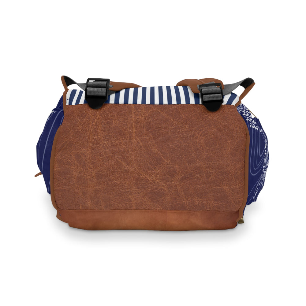 Brown leather bag with blue and white striped lining on a white background
