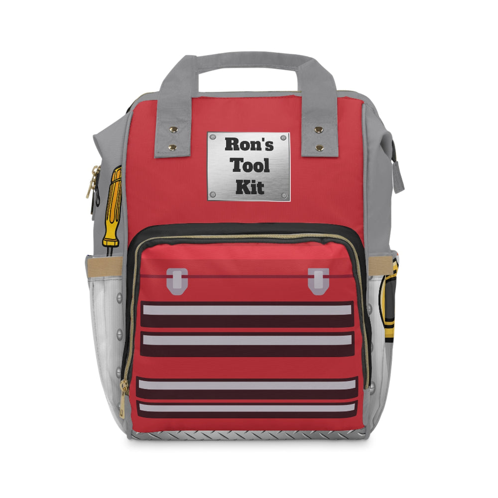 PBP Tool Box Style Red Dad's Diaper Backpack with 'Ron's Tool Kit' label on a white background