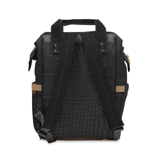 Briefcase Brown and  Black quilted diaper backpack with black accents and on a white background