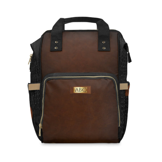 Briefcase Brown diaper backpack with black accents and personalized logo on a white background