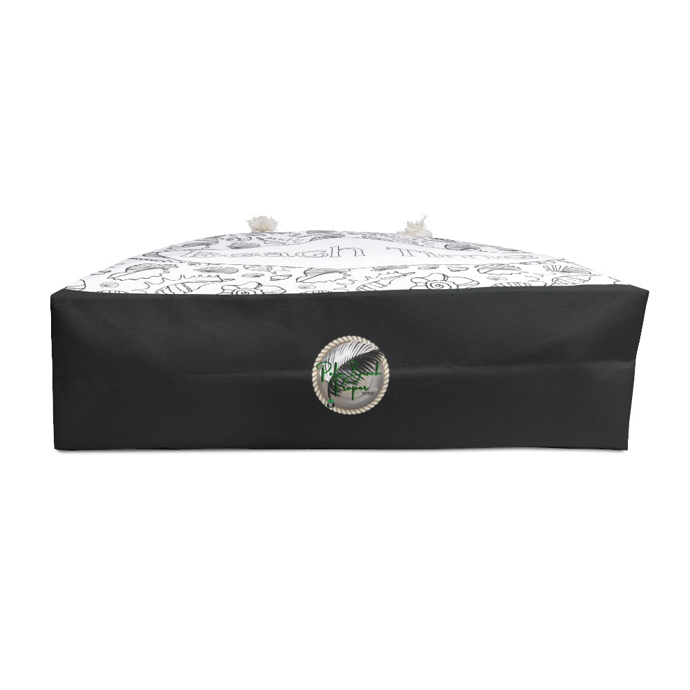 PBP Beach Tote  Color Me bottom of tote Black rectangular box with a white lid featuring floral patterns on a white background